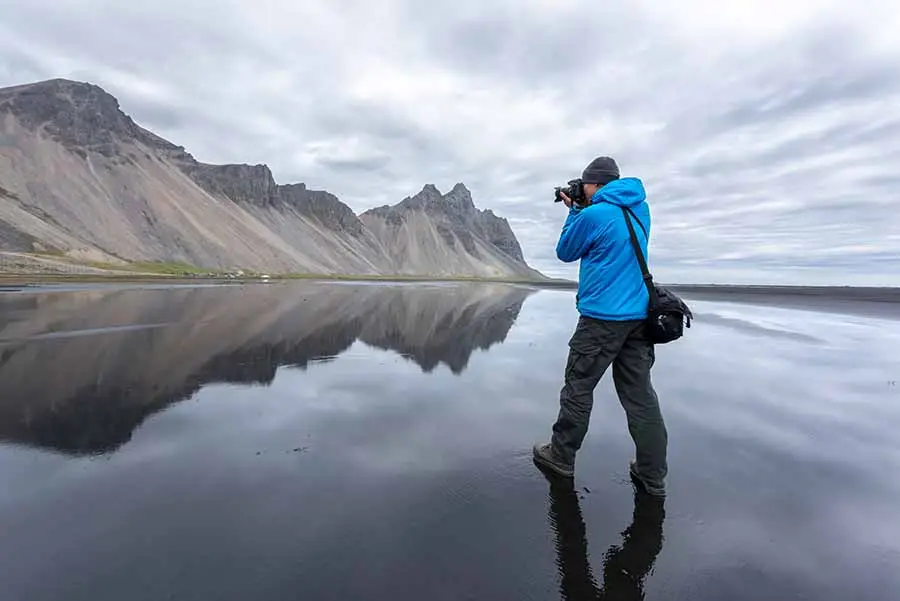 Photographer capturing stunning images in Iceland.